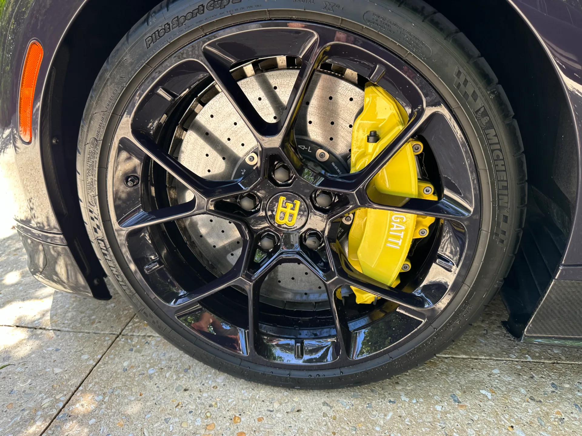 Bugatti Chiron parked beside a Range Rover after on-site detailing in Palm Beach County