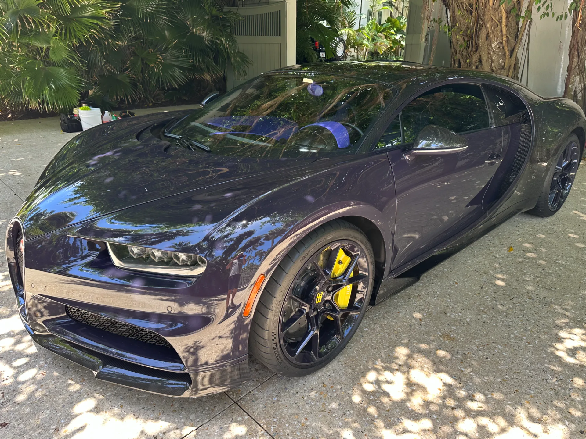 Bugatti Chiron wheel and yellow caliper cleaned in detail